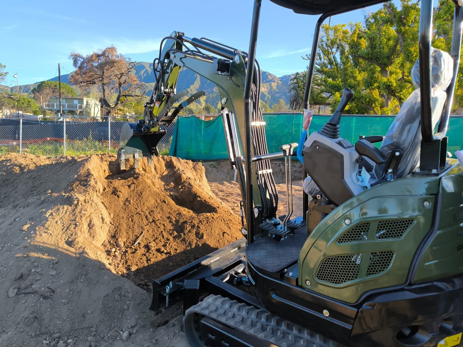 Client using machine attachment in the field