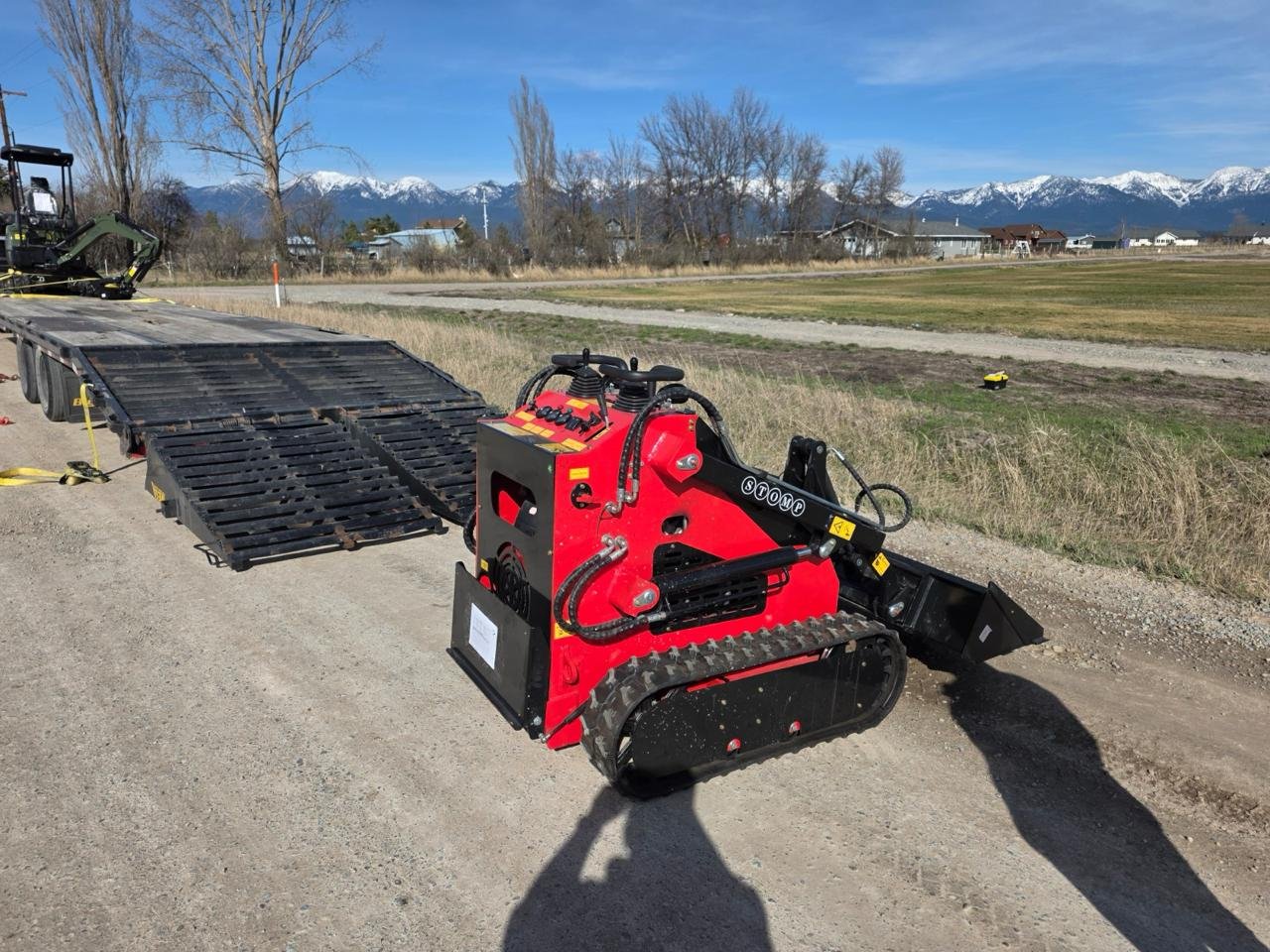 Client compact machine handling outdoor material